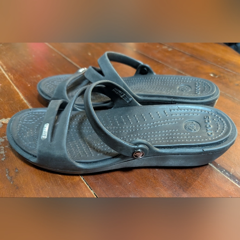 Crocs Women's Strappy slip on sandals Black size 8